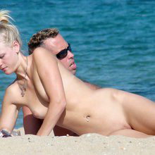 Nude beach  spread legs and