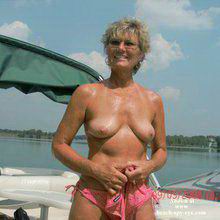 Stripped mature women at the seashore at all