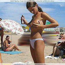 Pulling naturist girls are posing undressed at the seashore with the at all