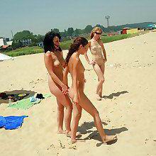 tanned damsels removes briefs on the nude beach at all