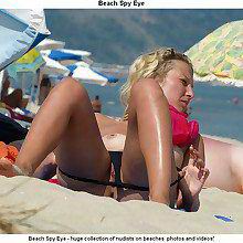 fkk photos  relaxed beach exhibitionist offers pussy for sun on at all