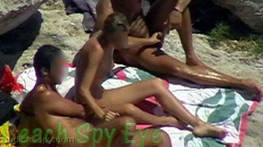 Nude Beaches Pics Nudist having group sex at essential beach Image 3
