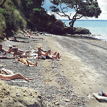Unembellished girls sunbathes nude