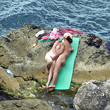 Sexual actions of nudists filmed on a hidden camera.