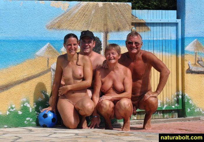 Amateurs Beach Bare  Appealing clasp Naturist having a splendid time.. Image 8